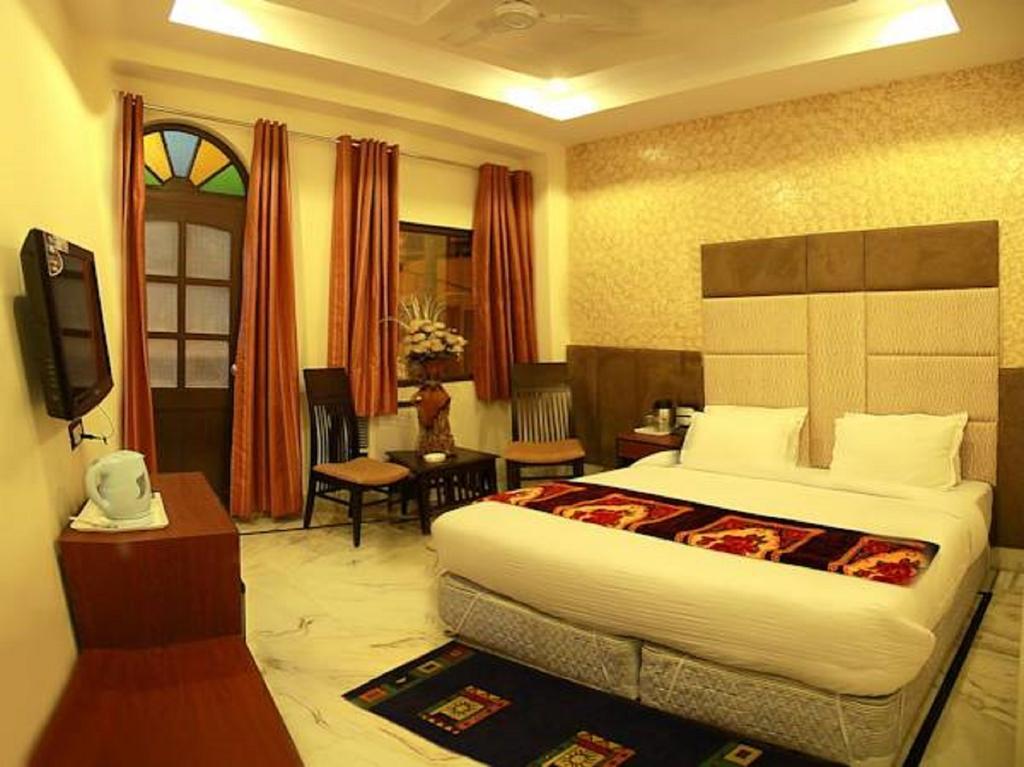 Hotel Wall City New Delhi Phòng bức ảnh