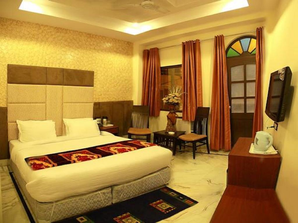 Hotel Wall City New Delhi Phòng bức ảnh