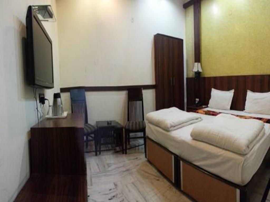 Hotel Wall City New Delhi Phòng bức ảnh